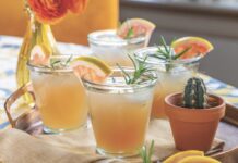 Classic Paloma with Rosemary Classic Paloma cocktail garnished with rosemary