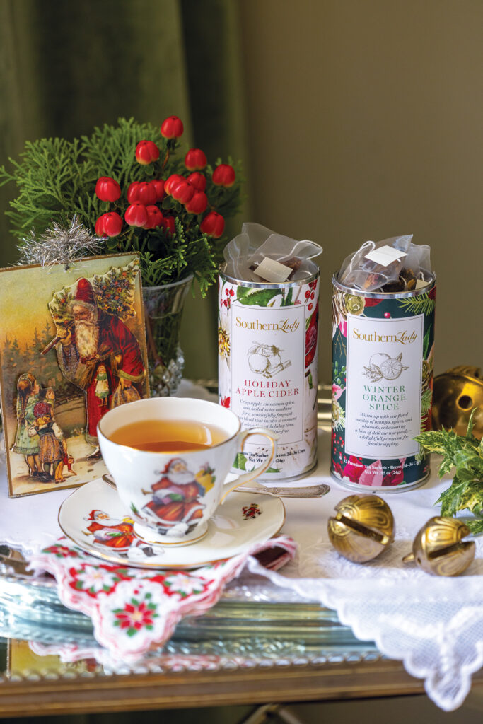 Teacup with canisters of tea 