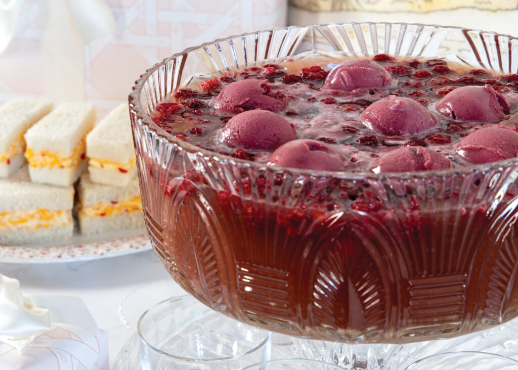 Pink raspberry punch in glass bowl