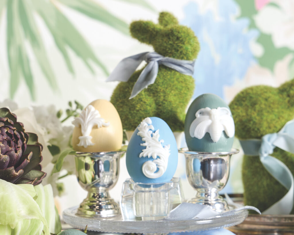 Three Easter Eggs and a grass bunny.