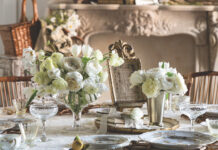 Spring is Here: Preview our March/April 2026 Issue A tablescape with two white floral arrangements.