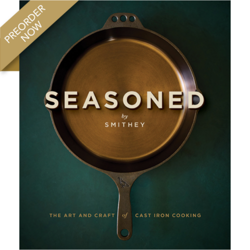 Book cover for Seasoned by Smithey, a guide to cast-iron cooking, showing a circular skillet on a teal background with a preorder ribbon on the corner.