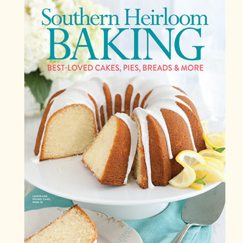Book cover for Southern Heirloom Baking showing a sliced lemon bundt cake with glaze on a pedestal, teal title text and red subtitle
