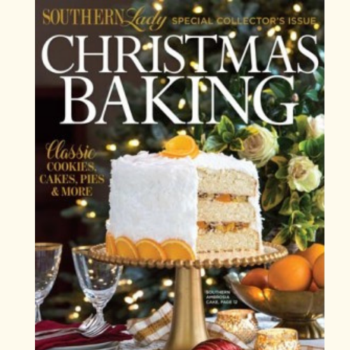 Magazine cover: Southern Lady Christmas Baking featuring a white frosted layered cake with orange slices, festive lights and greenery in the background.