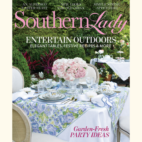 Southern Lady magazine cover: an elegant outdoor garden table set with floral cloth, pink bouquet centerpiece, and fine china.