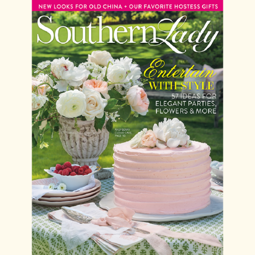 Southern Lady magazine cover with a pink frosted cake and a white floral centerpiece on an outdoor table.