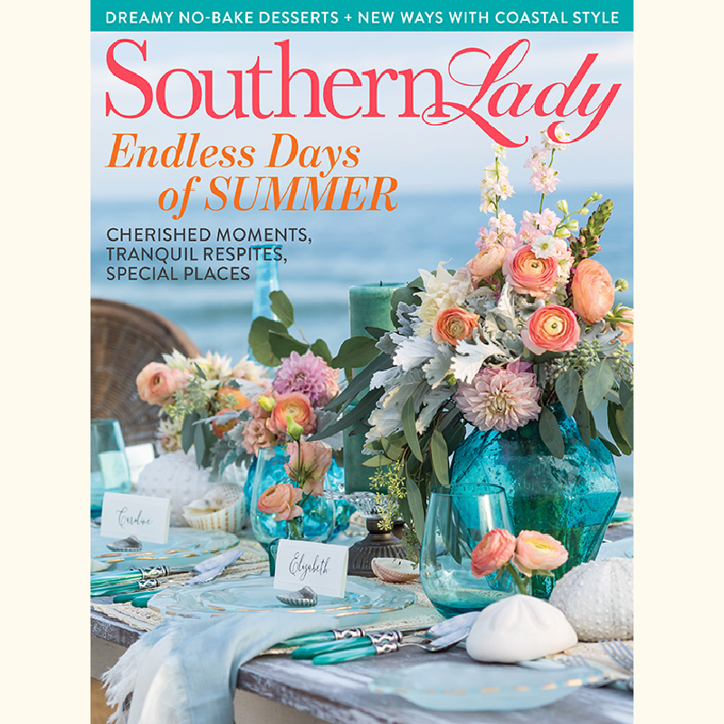 Cover of Southern Lady magazine: a coastal tablescape with pastel floral arrangements in turquoise glass vases by the sea