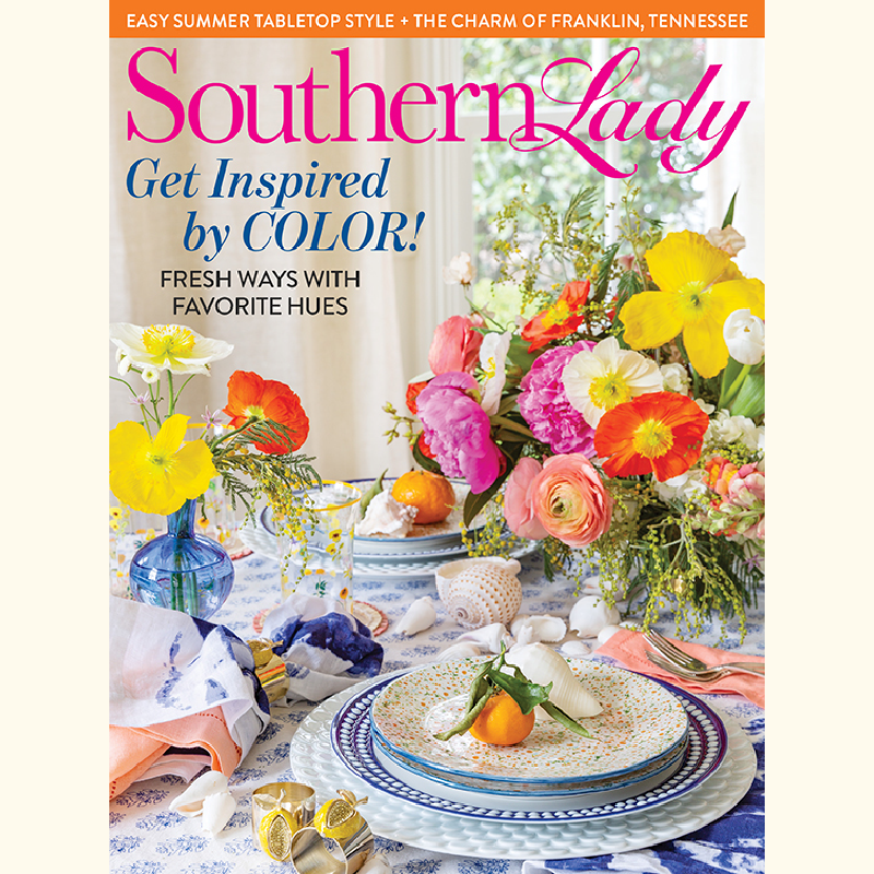 Cover of Southern Lady magazine featuring a vivid flower-filled tablescape and bold pink title, 'Southern Lady'.
