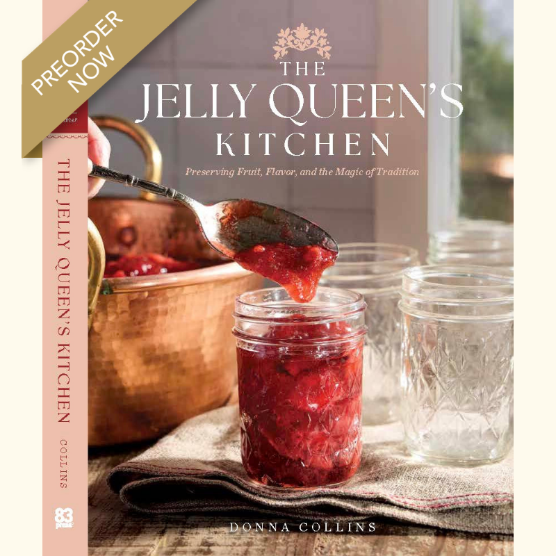 Cookbook cover for The Jelly Queen's Kitchen by Donna Collins, featuring a jar of red jelly and a PREORDER NOW ribbon.