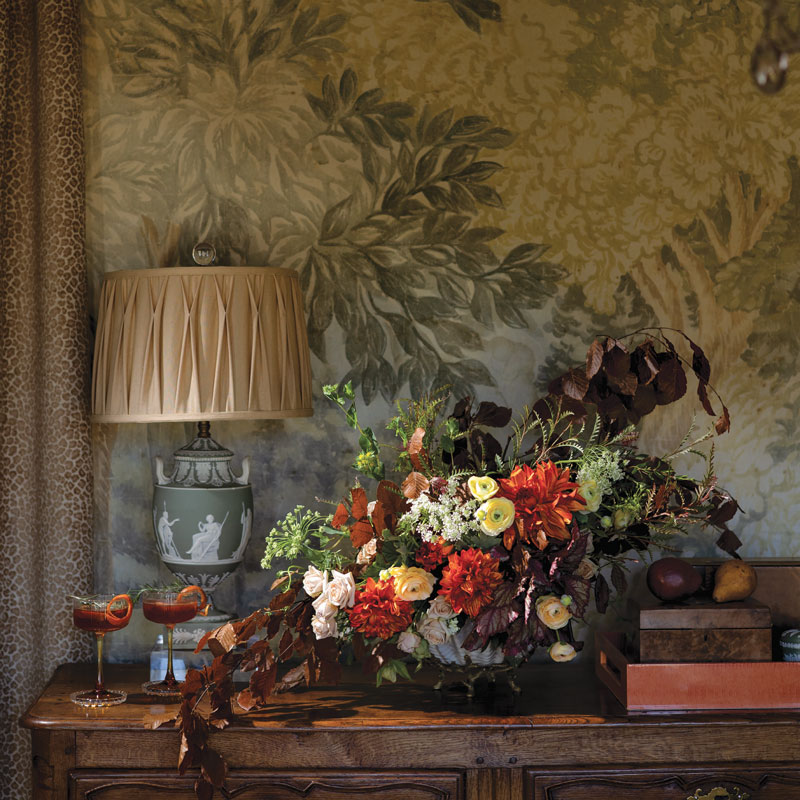 Table with florals and wedgewood lamp